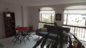 Χώρος καθιστικού στο Confort mejor Ambiente familiar