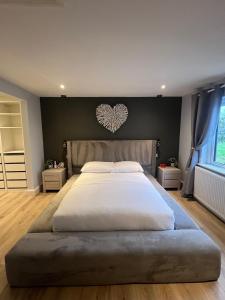 Postel nebo postele na pokoji v ubytování Biss barn house + 2 fotografie