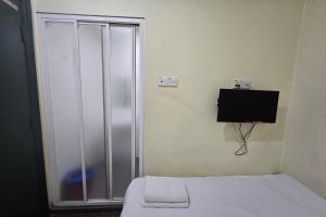 TV a/nebo společenská místnost v ubytování Fast Hotel Sri Gombak
