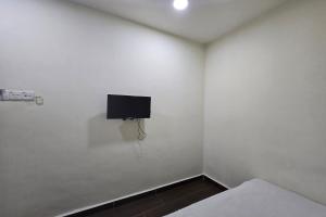 TV a/nebo společenská místnost v ubytování Fast Hotel Sri Gombak