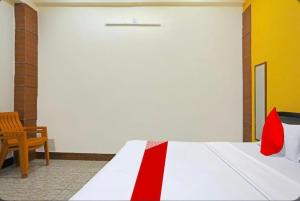 Hotel Mannu Grand客房内的一张或多张床位