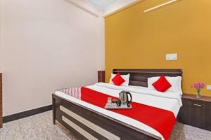 Hotel Mannu Grand客房内的一张或多张床位