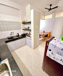 Kuchyň nebo kuchyňský kout v ubytování Urban Suites