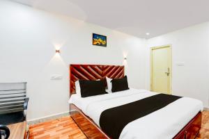 Postel nebo postele na pokoji v ubytování HOTEL O RMS GRAND