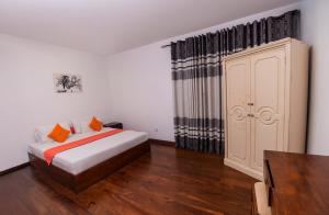 Postel nebo postele na pokoji v ubytování Chaminrich villa