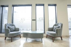 Ruang duduk di Kaashvi Residency - Managed by Atithi House
