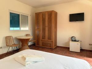 TV a/nebo společenská místnost v ubytování Sunset Beach Resort
