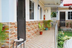 Imagine din galeria proprietății AJ Residences Apartelle Camotes RedPartner în Esperanza +37 fotografii