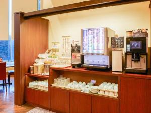 Příslušenství pro přípravu čaje a kávy v ubytování Goi Grand Hotel