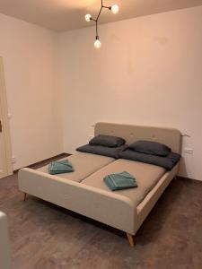 Postel nebo postele na pokoji v ubytování Pearl Bee Deluxe Suites