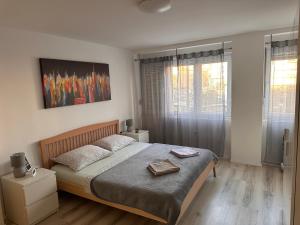 Posteľ alebo postele v izbe v ubytovaní Apartment Ella Mare