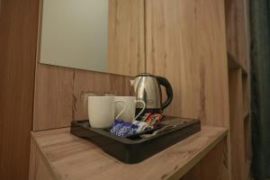 Kemudahan buat kopi dan teh di Kaashvi Residency - Managed by Atithi House