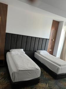 Postel nebo postele na pokoji v ubytování Hotel Sydney