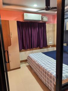 Postel nebo postele na pokoji v ubytování Amritdhara Boys Hostel