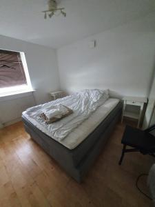 Postel nebo postele na pokoji v ubytování 7 sovrum 8 bäddar 9 sovplatser