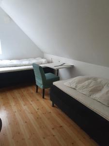 Postel nebo postele na pokoji v ubytování 7 sovrum 8 bäddar 9 sovplatser