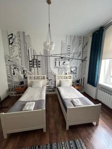 Posteľ alebo postele v izbe v ubytovaní Atelier Hostel