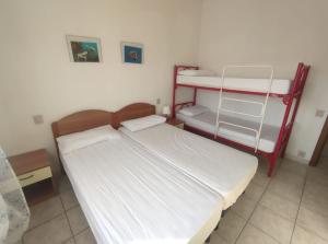 Postel nebo postele na pokoji v ubytování Villa Cortina