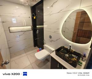 a bathroom with a sink and a mirror at The grange valley view in Panchgani +61 photos