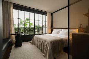 Postel nebo postele na pokoji v ubytování Chongqing Wuyu Shanxing Hotel