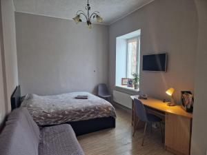 Postel nebo postele na pokoji v ubytování Small and cozy studio flat