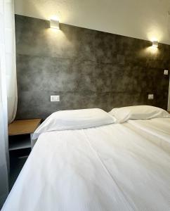 Albergo del Pozzo客房内的一张或多张床位