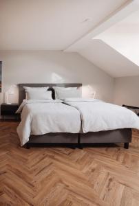 Letto o letti in una camera di DOM Apartment II - modern & zentral mit kostenfreiem Parkplatz