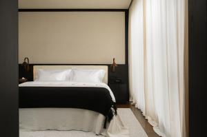 Postel nebo postele na pokoji v ubytování Chongqing Wuyu Shanxing Hotel