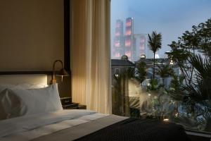 Postel nebo postele na pokoji v ubytování Chongqing Wuyu Shanxing Hotel