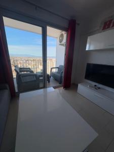 Giường trong phòng chung tại Holidays Sylvia 13