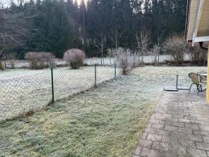 Zahrada ubytování Ferienhäuser in Postmünster am See, mit eigenem Garten, mit Vierbeiner!