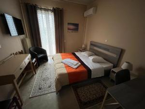 Postel nebo postele na pokoji v ubytování Hotel Stratos