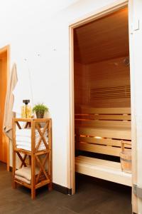 Gulta vai gultas numurā naktsmītnē Hotel Garni Aurora