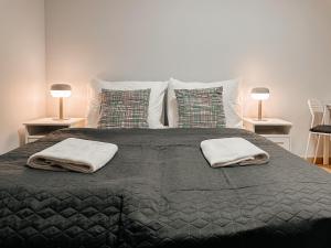 Postel nebo postele na pokoji v ubytování ELSO apartments