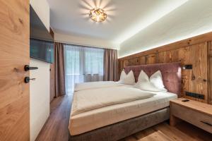 Łóżko lub łóżka w pokoju w obiekcie Montana Apartments