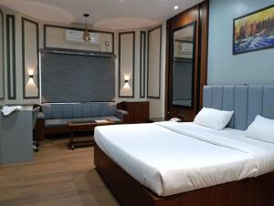Postel nebo postele na pokoji v ubytování Hotel Hello Jeypore