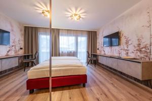 Łóżko lub łóżka w pokoju w obiekcie Montana Apartments