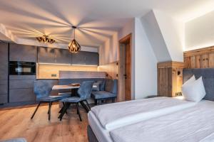 Łóżko lub łóżka w pokoju w obiekcie Montana Apartments
