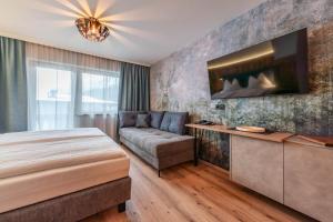 Łóżko lub łóżka w pokoju w obiekcie Montana Apartments
