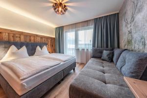 Łóżko lub łóżka w pokoju w obiekcie Montana Apartments