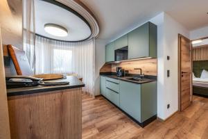 Kuchnia lub aneks kuchenny w obiekcie Montana Apartments