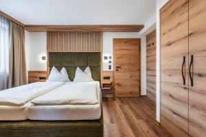 Łóżko lub łóżka w pokoju w obiekcie Montana Apartments