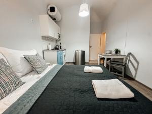 Postel nebo postele na pokoji v ubytování ELSO apartments