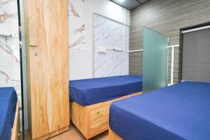 Postel nebo postele na pokoji v ubytování ZEST STAYS 1054-ANDHERI WEST