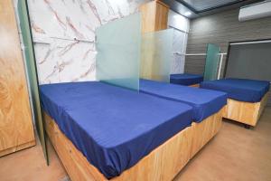 Postel nebo postele na pokoji v ubytování ZEST STAYS 1054-ANDHERI WEST