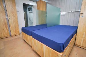 Postel nebo postele na pokoji v ubytování ZEST STAYS 1054-ANDHERI WEST