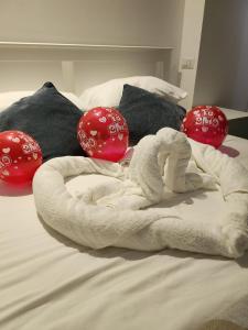 Giường trong phòng chung tại Orange boutique rooms