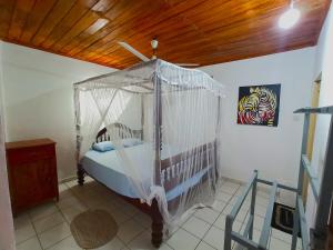 Кровать или кровати в номере Surfing Beach Guest House +10 фотографий