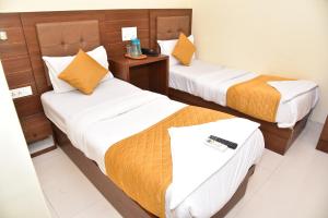 Postel nebo postele na pokoji v ubytování Hotel Embassy Suites