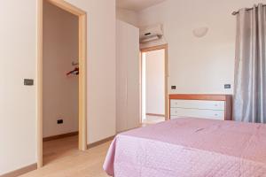 A bed or beds in a room at Villa Regno di Toscana